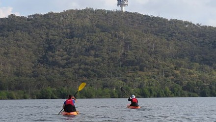 Two kayakers on Lake Burley Griffin