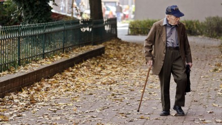 Old man walking down the street