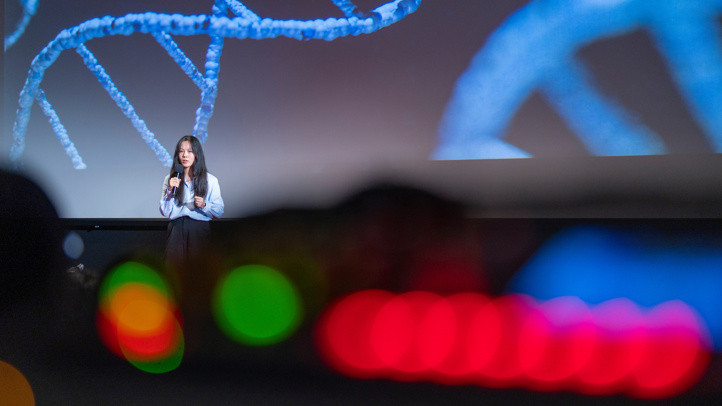 Daisy presenting "Uncovering your deep dark secrets: what can I see from you TB?" at the ANU 3MT Grand Final. Image: Jamie Kidston/ANU
