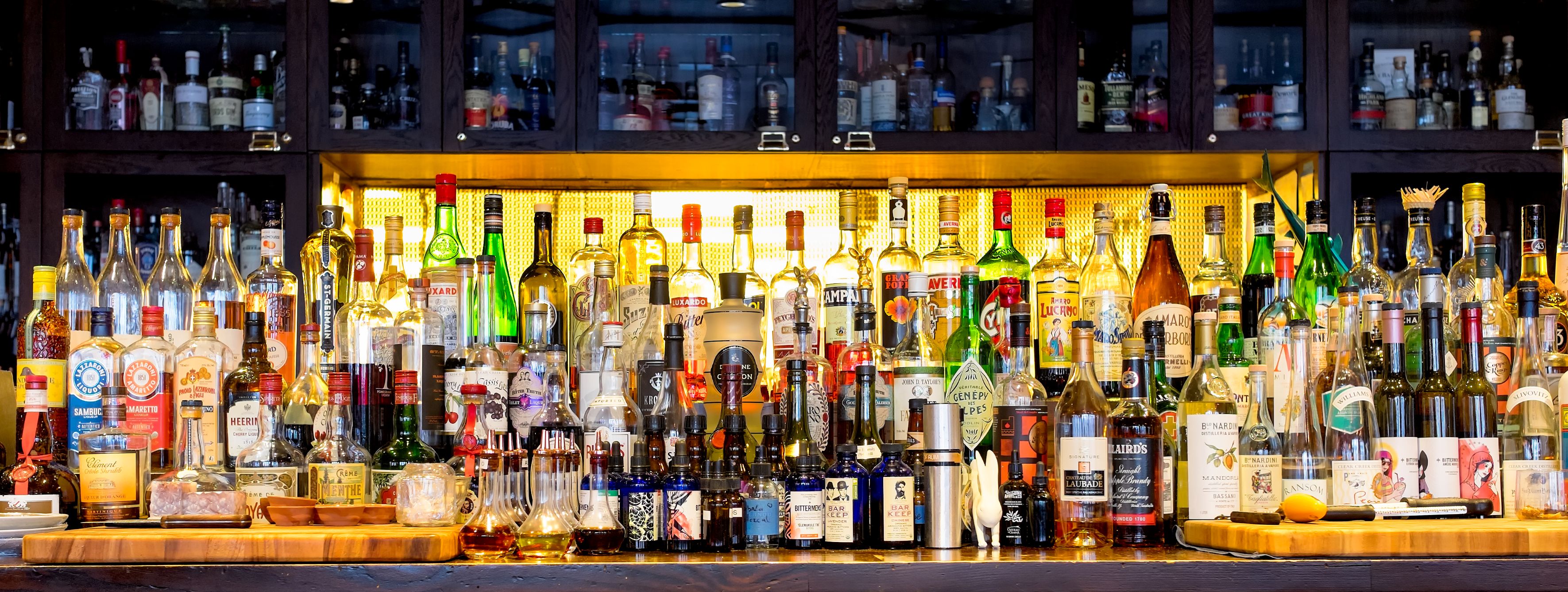 AdobeStock 290834642 Well stocked bar with spirits lined up