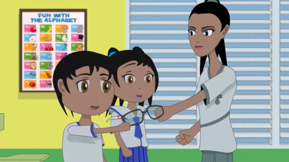 A female doctor in a white coat demonstrates using a stethoscope to two young animated children in a classroom with an alphabet poster in the background.