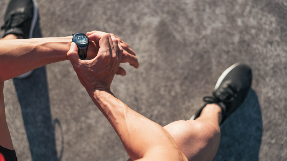 Image: Starstuff/Shutterstock.com Man checking watch