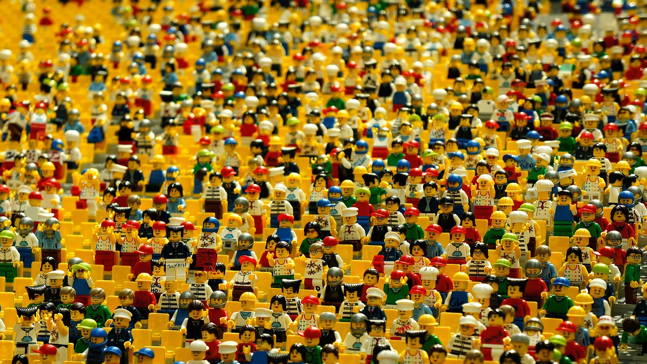 Crowded scene of various colorful Lego minifigures.