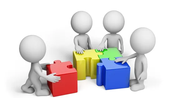 Four 3D cartoon figures assembling large puzzle pieces in red, yellow, green, and blue.