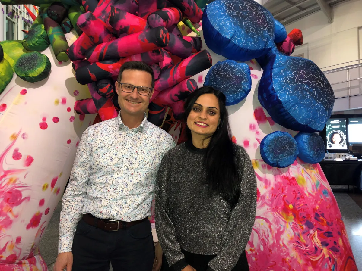 Professor David Tscharke and Dr Meru Sheel with ‘Microbial’ – an art installation raising awareness to the threat of antimicrobial resistance and superbugs, on loan to Questacon from the UN General Assembly. Photo: Liz Drummond