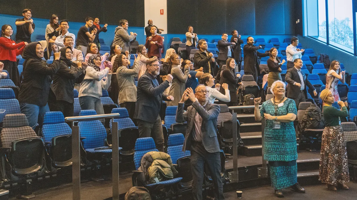 Attendees joined a “3-minute Pacific Break” dancing session between seminars. Image: Calo Huang/ANU