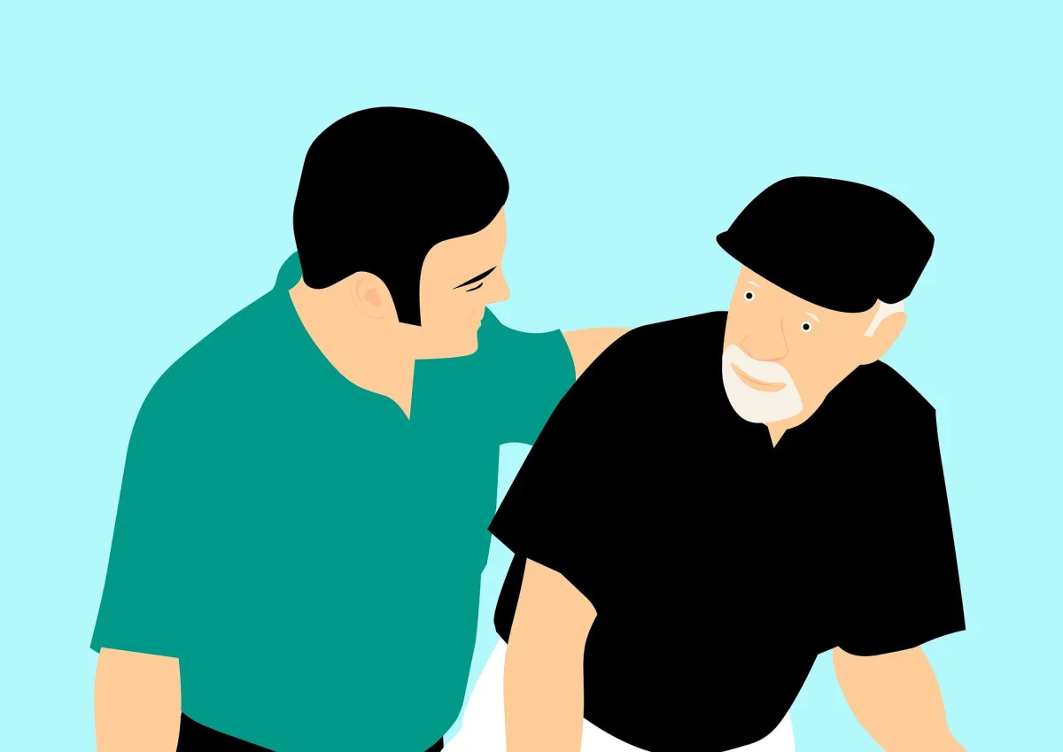 A young man in a green shirt assists an elderly man in a black shirt and cap, both looking towards each other against a light blue background.